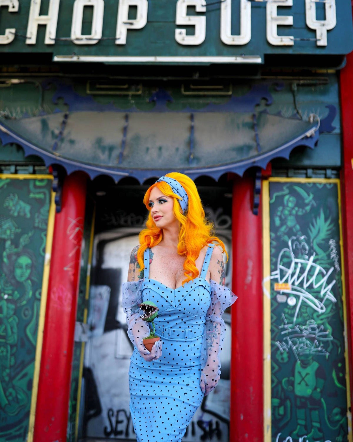 A female pinup model with orange hair from the book "Vestige: Twenty Years of Modern Pin-Up"