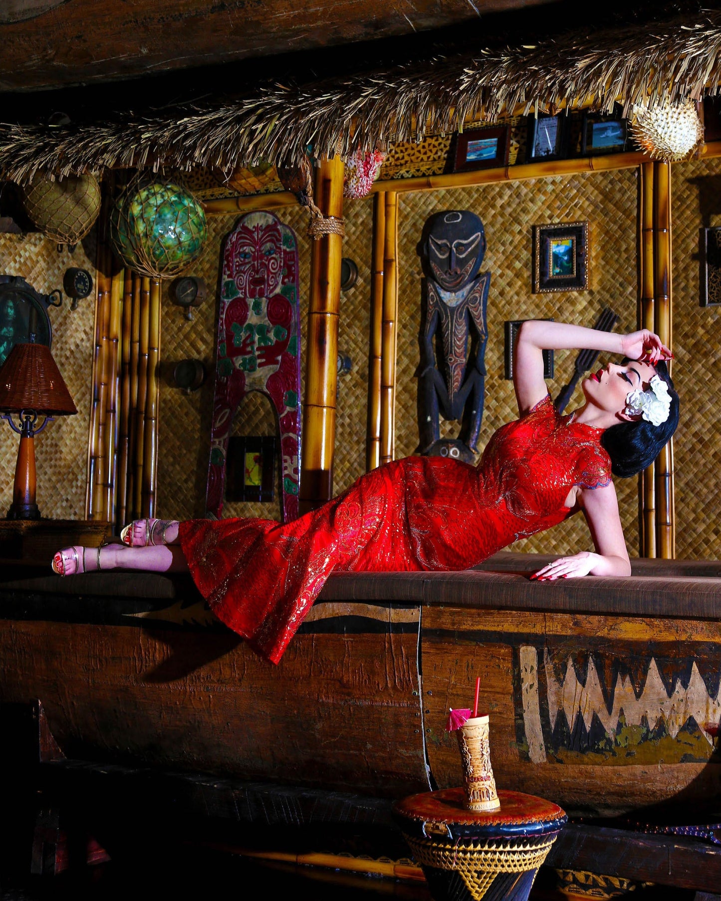 A female pinup model in a Tiki bar setting from the book "Vestige: Twenty Years of Modern Pin-Up"