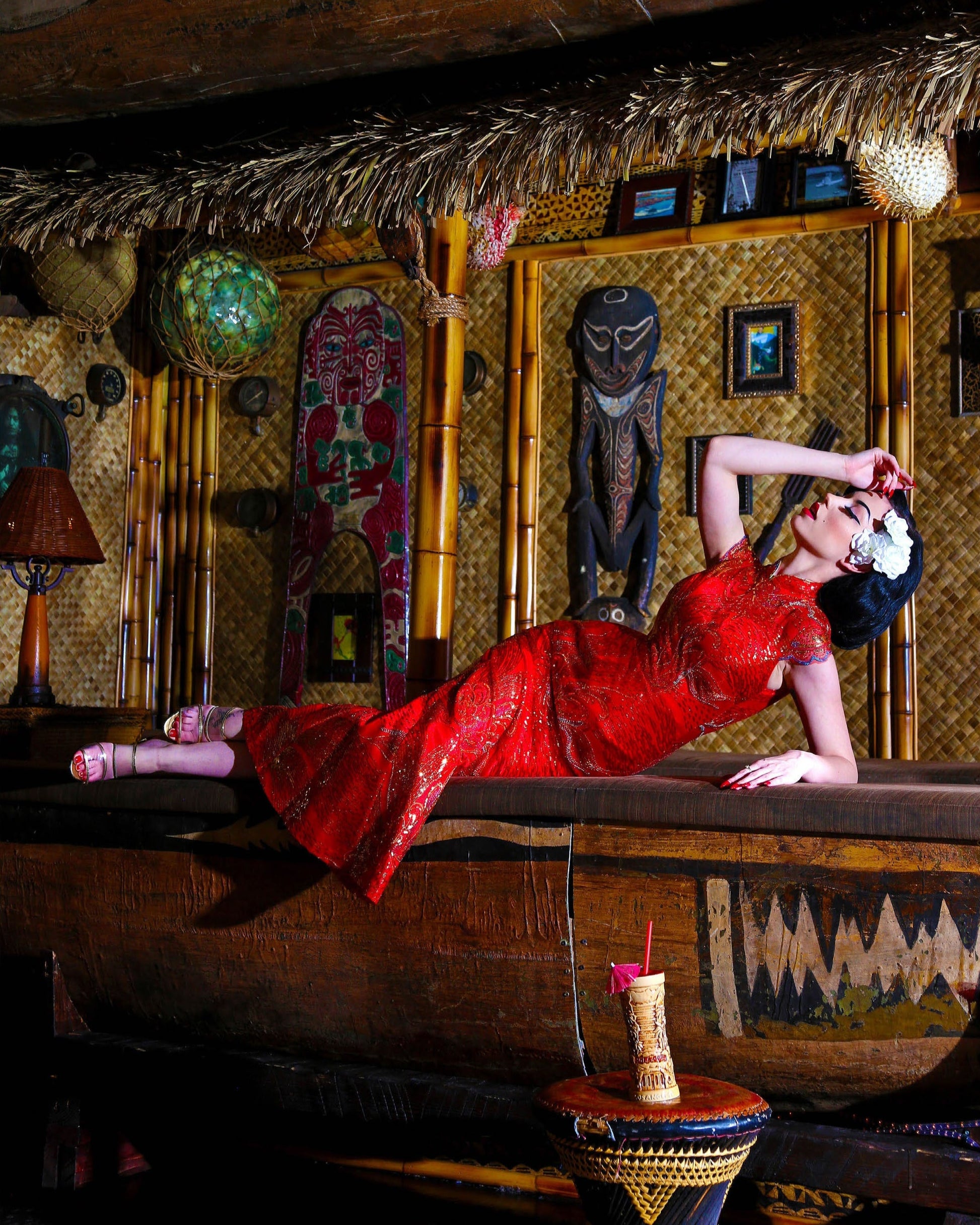 A female pinup model in a Tiki bar setting from the book "Vestige: Twenty Years of Modern Pin-Up"